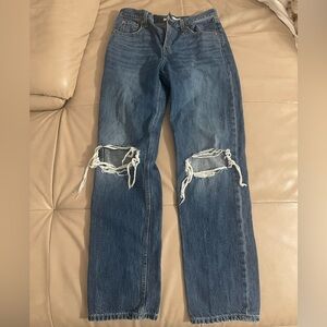 Levi’s Distressed Blue High-Rise Jeans with Knee Rips